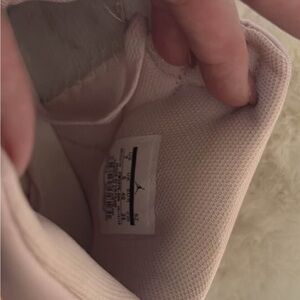 Pink air jordans women’s size 9 men’s size 7.   NEW
